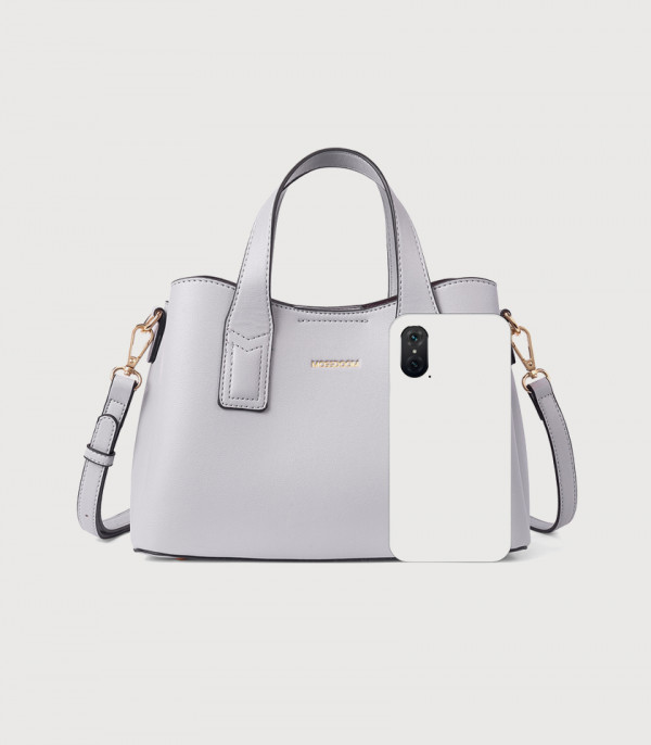 Size comparison of the light gray MOSSDOOM Cerise tote bag with a smartphone.