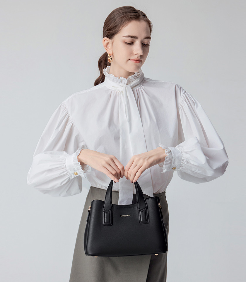 MOSSDOOM Cerise black vegan leather tote bag, front view.