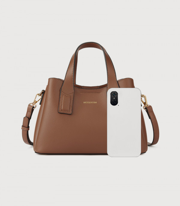 Size comparison of the brown MOSSDOOM Cerise tote bag with a smartphone.