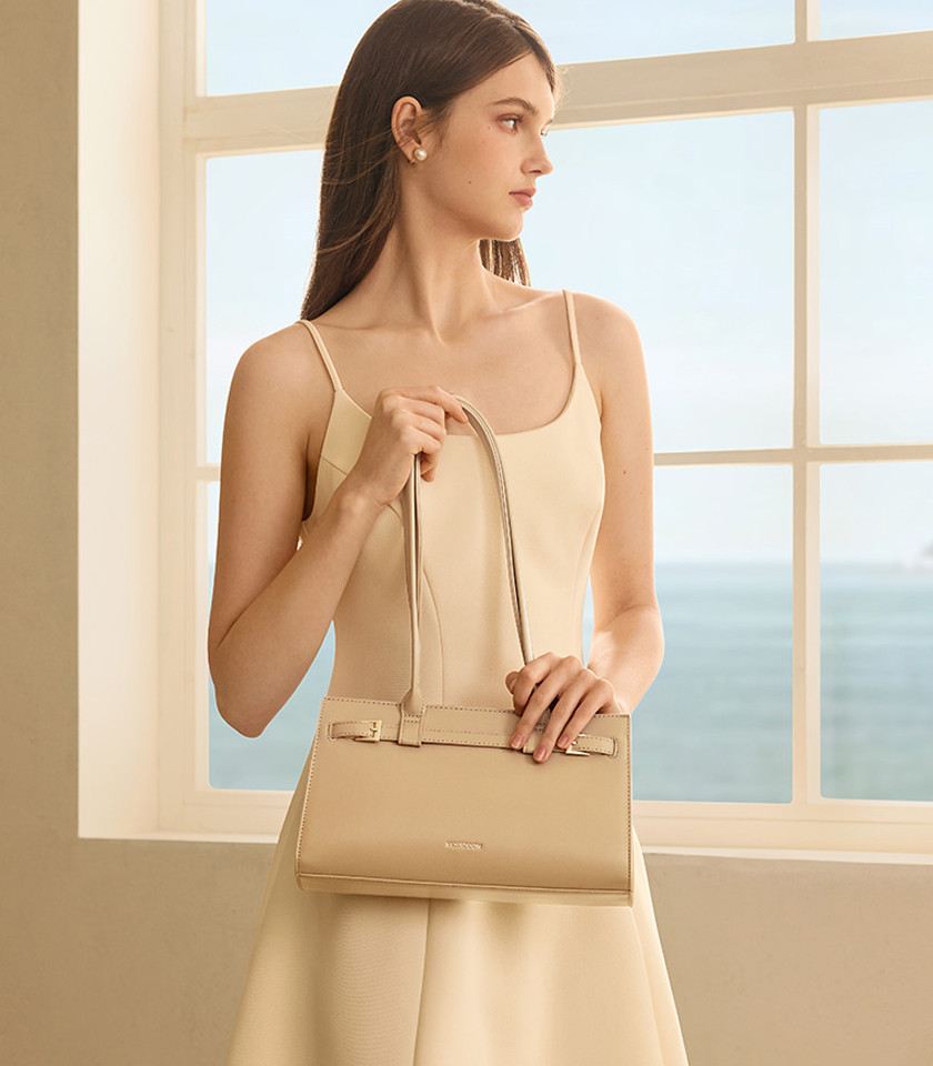 MOSSDOOM Aurelia rectangular shoulder bag in cream vegan leather, front view.