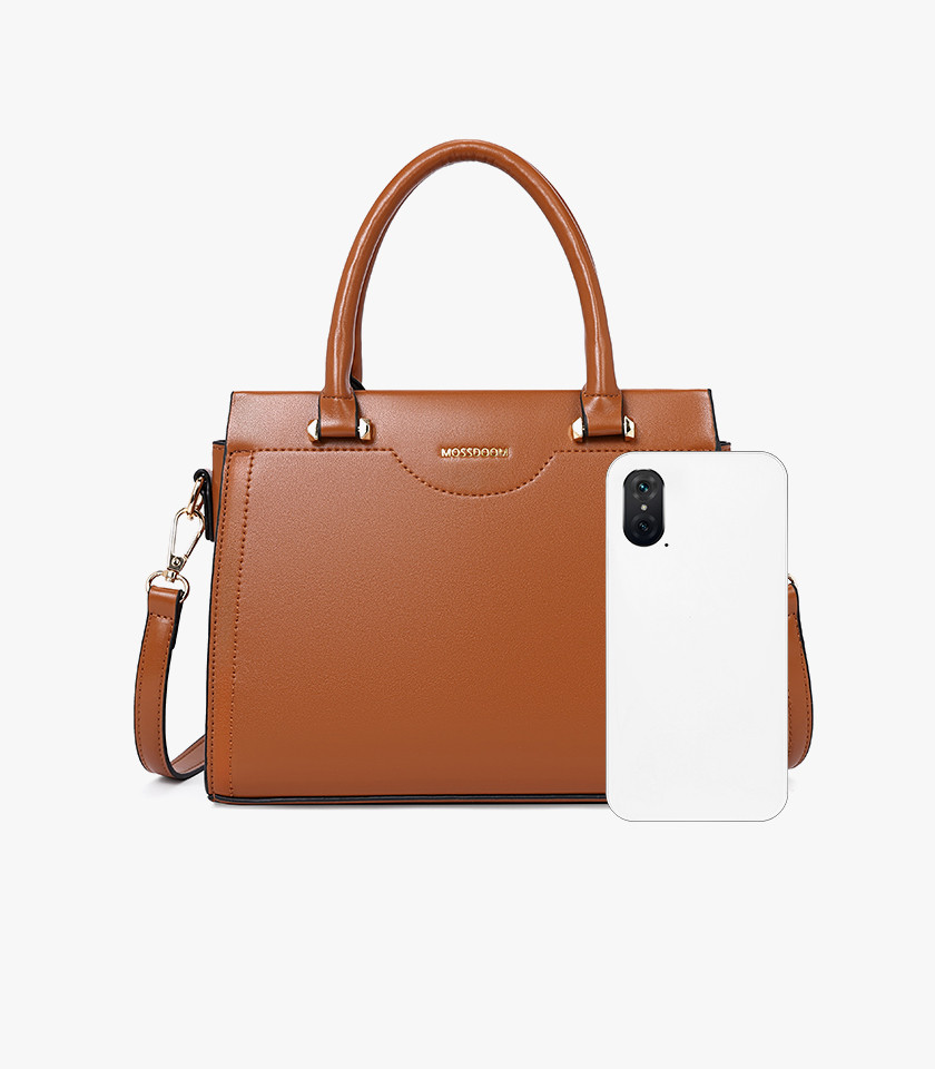 Model wearing the MOSSDOOM AMANDE Camel color tote bag on her shoulder.