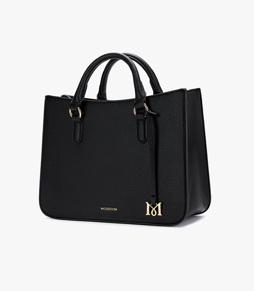 MOSSDOOM MIRABELLE structured handbag, black color, carried by hand by a model.