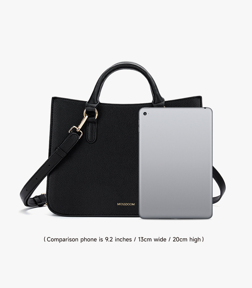 MOSSDOOM MIRABELLE structured handbag, black color, carried by hand by a model.