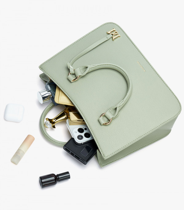 Capacity of the MOSSDOOM MIRABELLE structured handbag, Pistachio color, shown open with its contents.