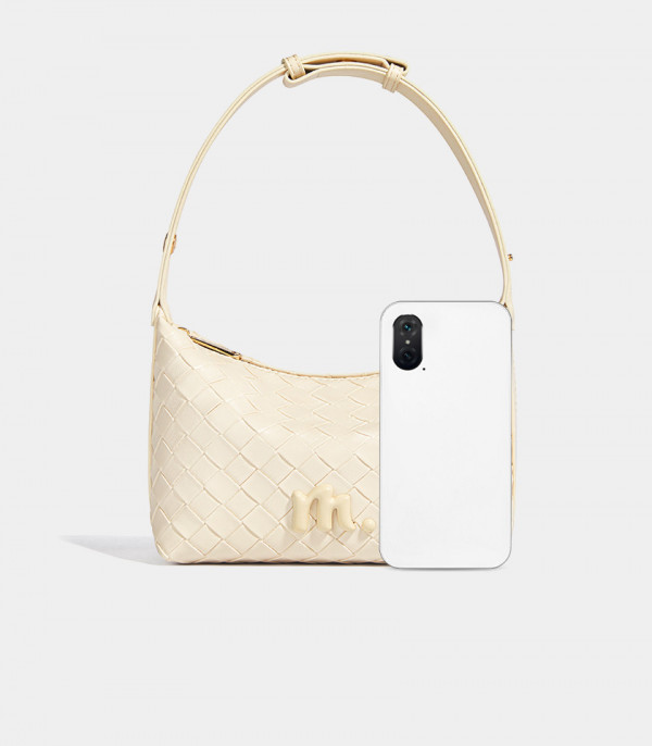Size scale of the CELESTIA woven hobo bag - MOSSDOOM Ivory color, compared to a smartphone.