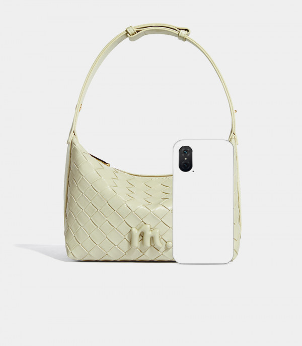 Size scale of the CELESTIA woven hobo bag - MOSSDOOM Pistachio color, compared to a smartphone.