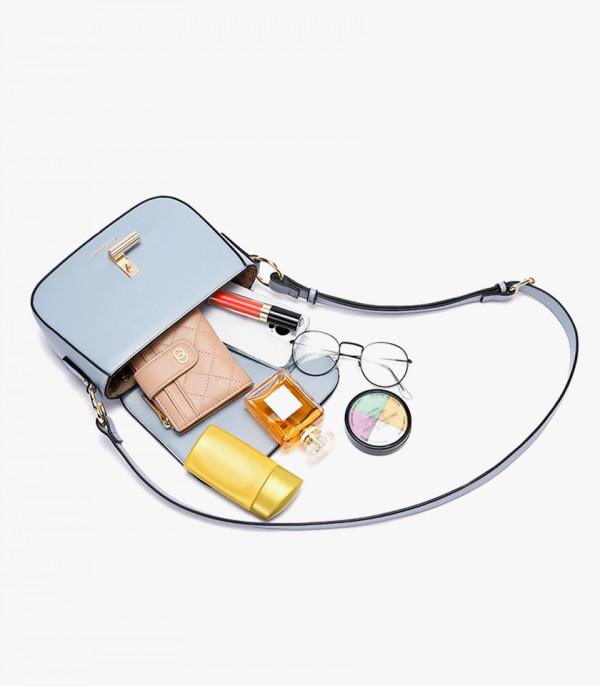 Capacity of the MOSSDOOM AIRELLE shoulder bag, Sky Blue color, shown open with its contents.