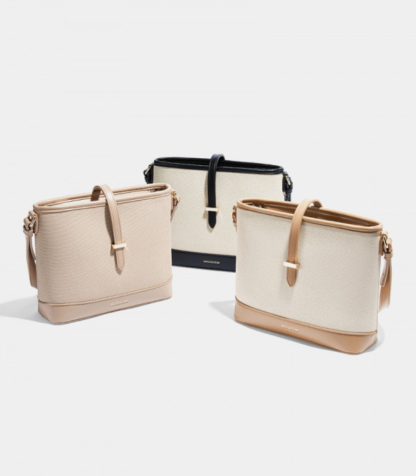 Color range of the CATLY shoulder bag - MOSSDOOM: apricot, black, and ivory.