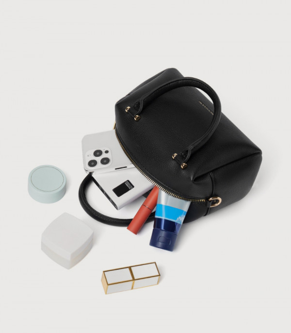 Capacity of the MOSSDOOM MARCIA top handle bag, Black color, shown open with its contents.