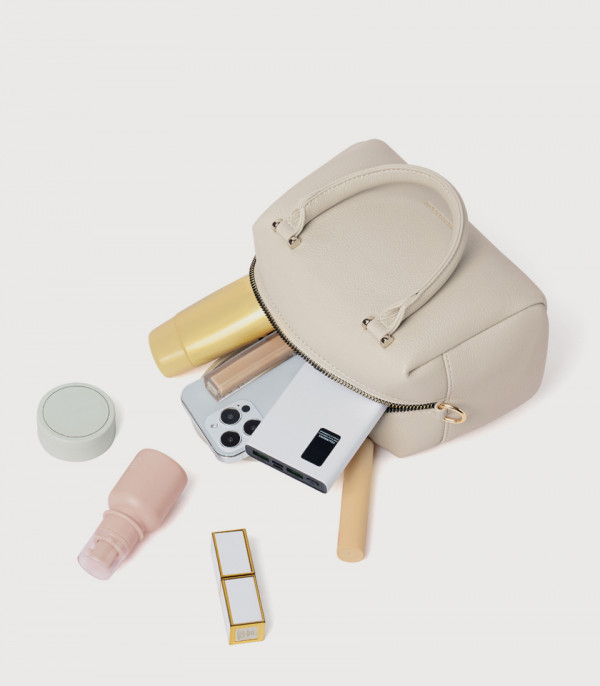 Capacity of the MOSSDOOM MARCIA top handle bag, Apricot Color, shown open with its contents.