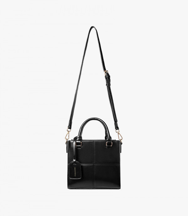Borsa a mano strutturata MOSSDOOM CUBIQUE colore Nero, con la sua tracolla visibile.