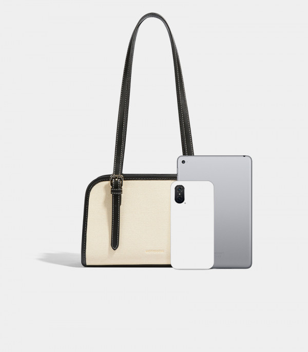 Size scale of the MOSSDOOM RENÉE CANVAS shoulder bag, Black linings, compared to phones.