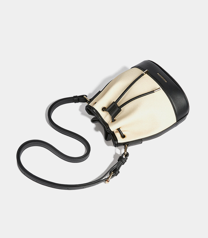 MOSSDOOM Alicia shoulder bucket bag, two-tone canvas and black leather, front view.