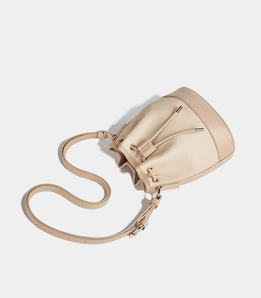 MOSSDOOM Alicia shoulder bucket bag, two-tone canvas and beige leather, front view.