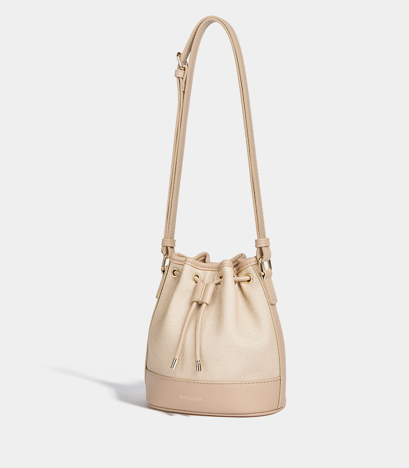MOSSDOOM Alicia shoulder bucket bag, two-tone canvas and beige leather, front view.