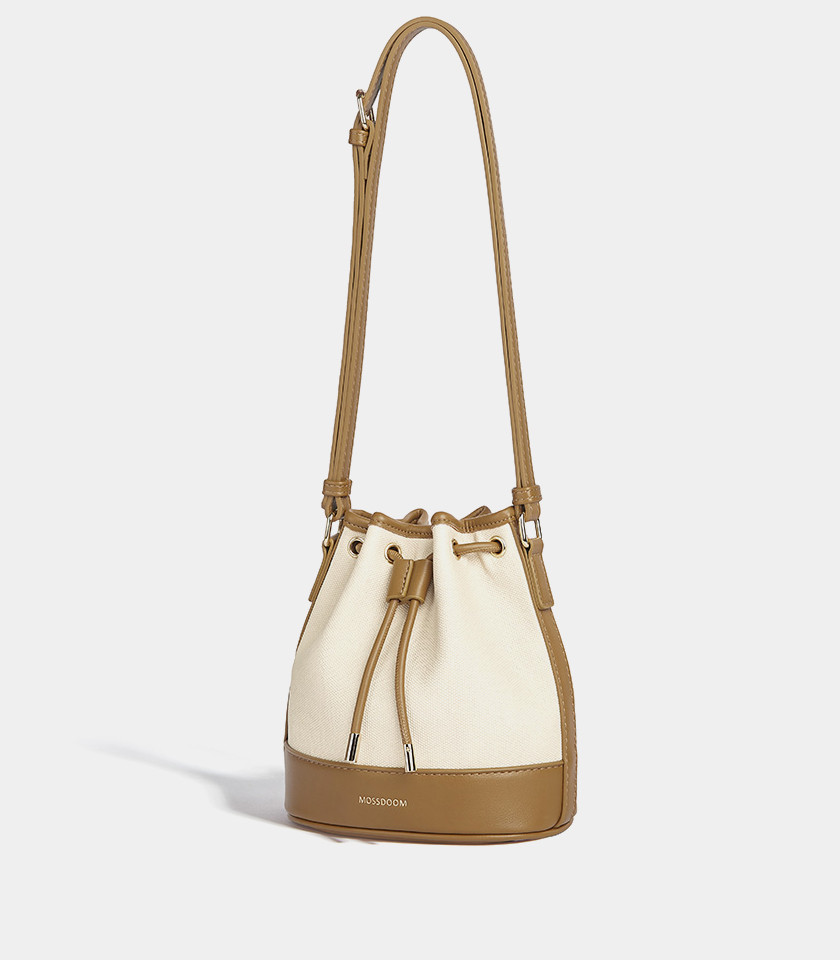 Top view of the brown Alicia bucket bag, showing the drawstring opening and the strap.