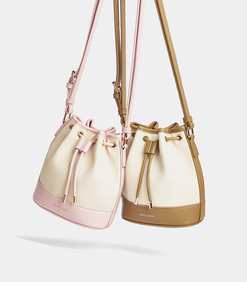 MOSSDOOM Alicia shoulder bucket bag, two-tone canvas and pink leather, front view.