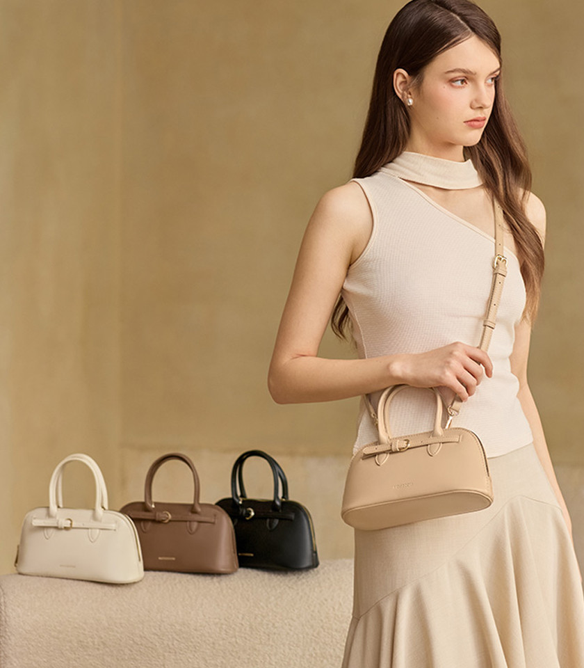 MOSSDOOM Alaura beige bowling handbag with shoulder strap, front view.