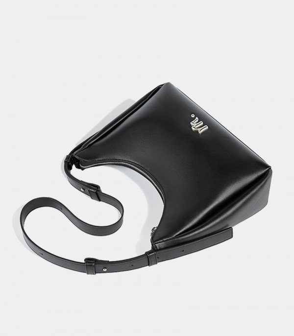 Top view of the Deanna black crossbody bag, showing its hobo shape and zipper.