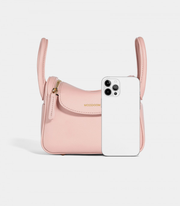 Size of the MOSSDOOM Zenith salmon handbag compared to a smartphone.