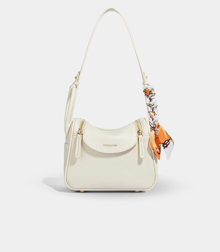 MOSSDOOM Zenith ivory crossbody bag with a decorative scarf on the handle.