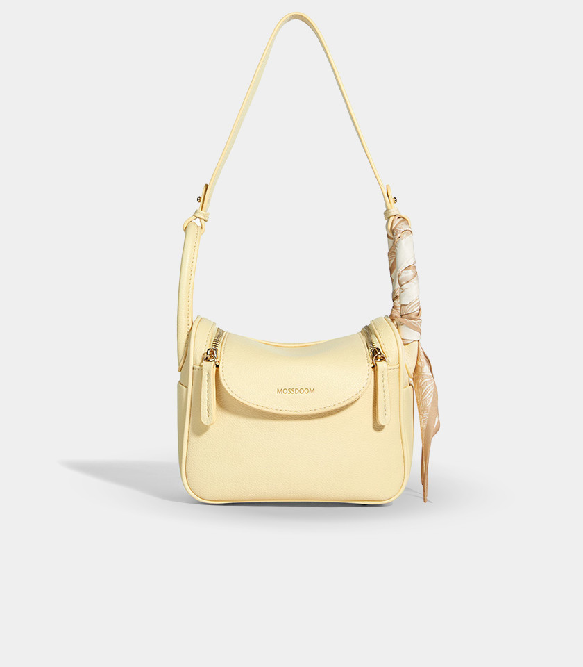 MOSSDOOM Zenith apricot crossbody bag with a decorative scarf on the handle.