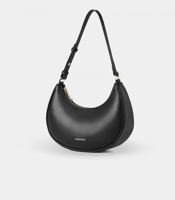 Three-quarter view of the Kattie black hobo bag showing its curved shape.