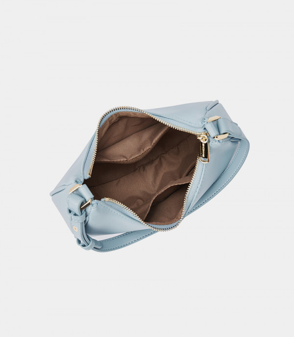 Inside of the MOSSDOOM Kattie sky blue hobo bag with its storage compartments.