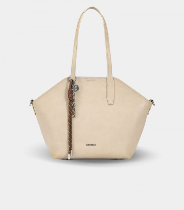 TRAPEZIO tote bag – CHRISBELLA Cream color, front view with charm.