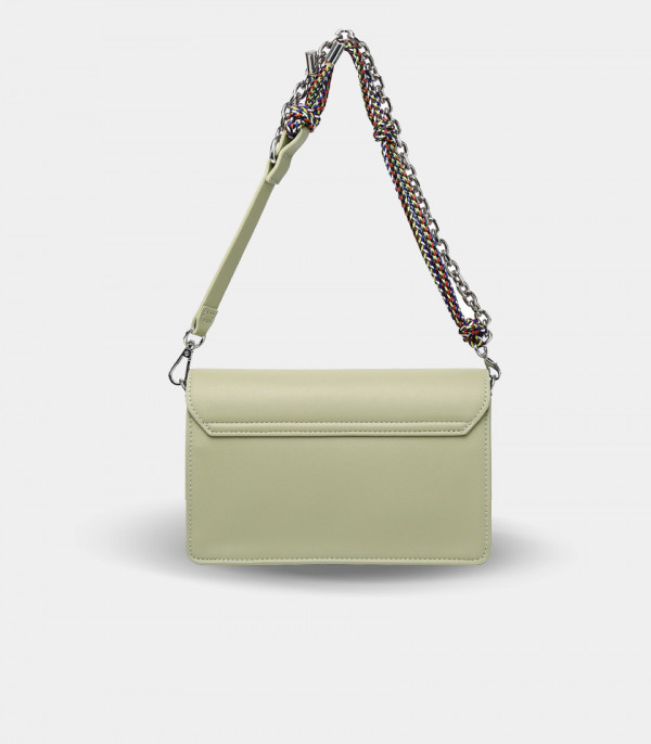 Side view of the EMPREINTE FÉFÉ chain shoulder bag – Pistachio color.