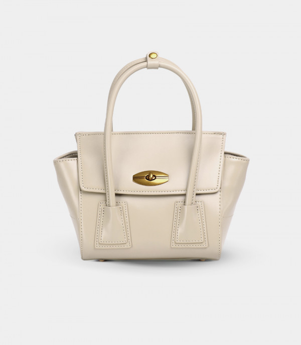HÉRITAGE FÉFÉ handbag with strap – Cream color, front view.