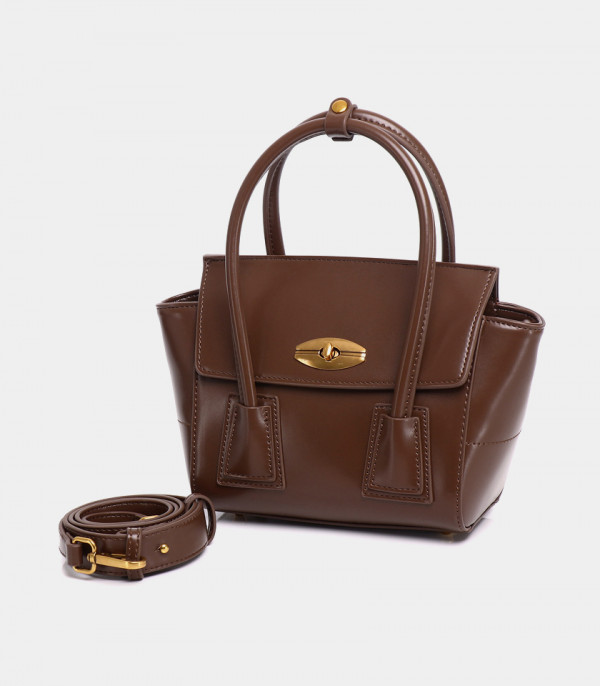 HÉRITAGE FÉFÉ handbag, Coffee color, with its removable shoulder strap.