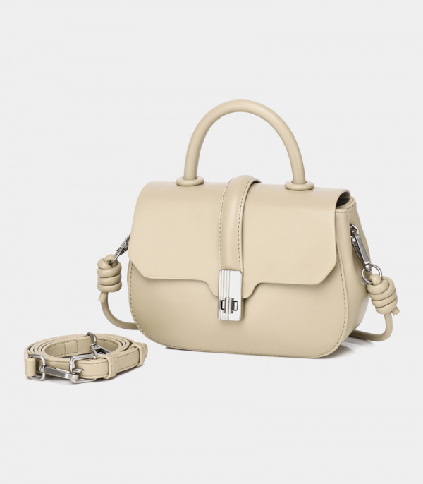 ORBITE FÉFÉ handbag, Cream color, with its removable shoulder strap.