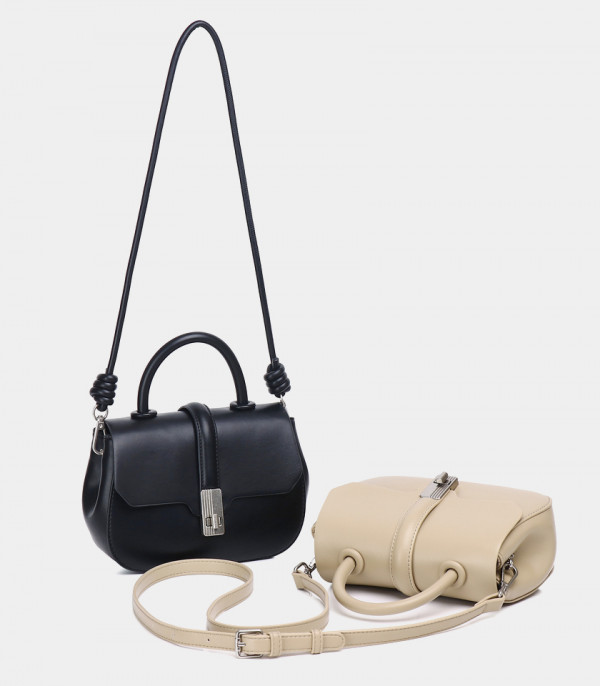 ORBITE FÉFÉ handbags in Black and Cream colors.
