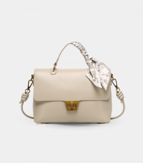 SINGULIER FÉFÉ handbag with strap – Cream color, front view with scarf.