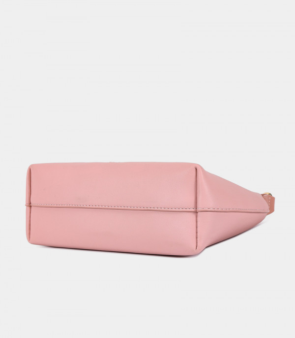 Bottom view of the ORIGINE half-moon mini hobo bag, Salmon color.