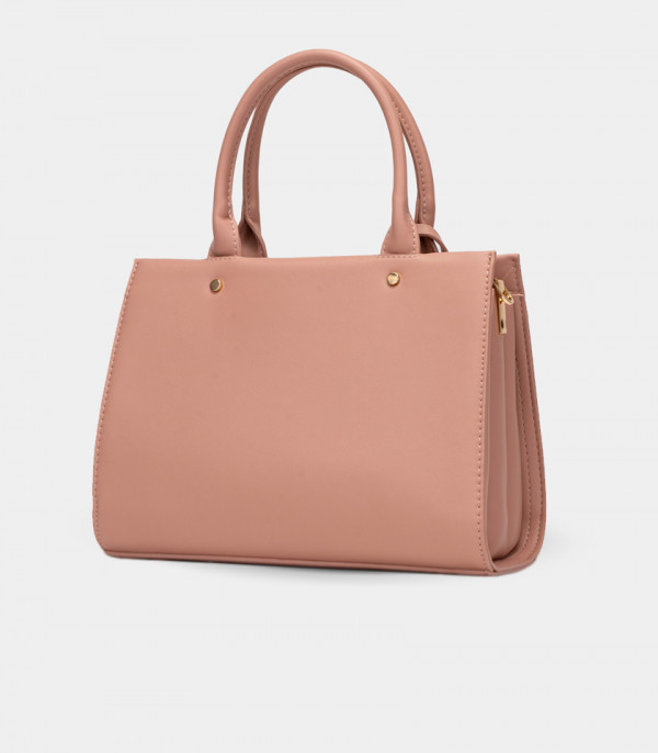Back view of the SYMBOL handbag with strap - BAGCO Salmon color.
