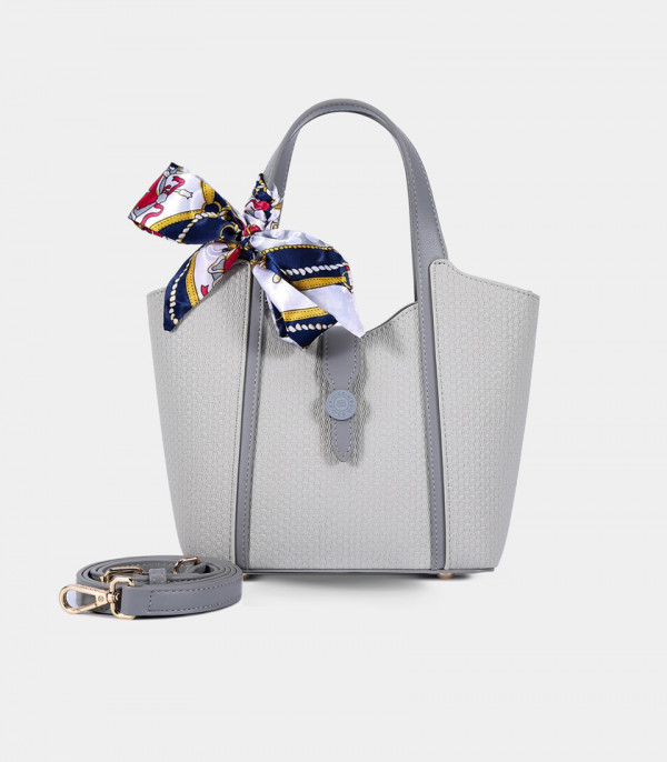 RIVE GAUCHE scarf bucket bag - BAGCO Gray color, with its shoulder strap.