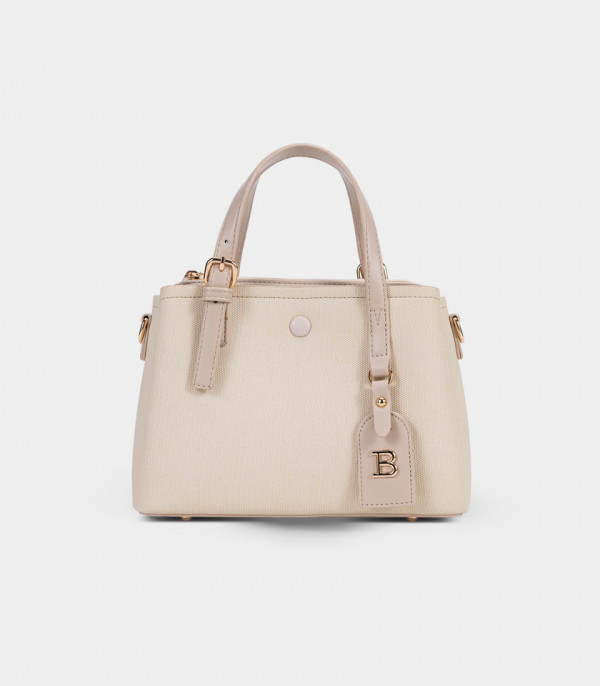 Close-up on the zipper of the SYMBIOSE structured handbag - BAGCO.