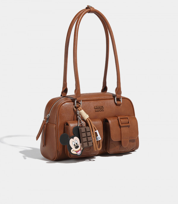 DISNEY MICKEY MOUSE bowling shoulder bag, Camel color, three-quarter view with charm.