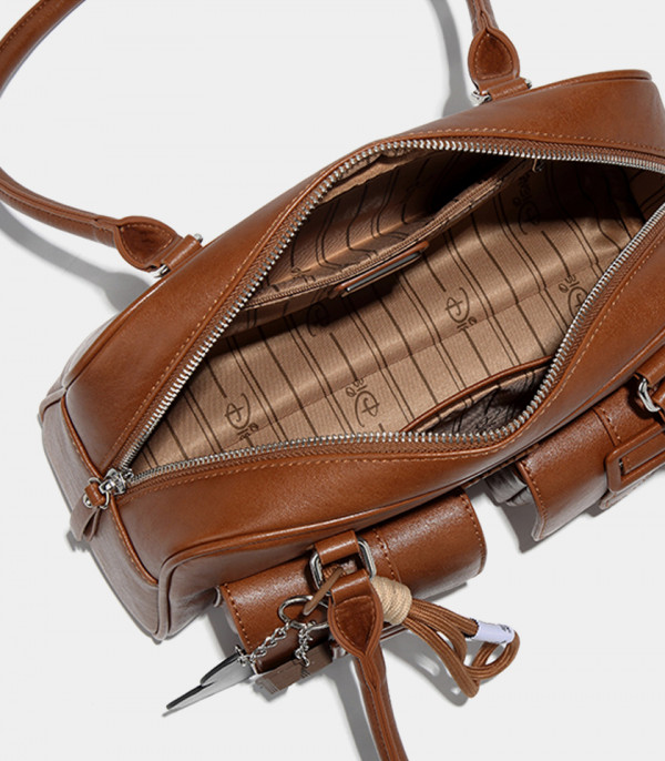Interior view of the DISNEY MICKEY MOUSE bowling shoulder bag, Camel color, showing the lining.